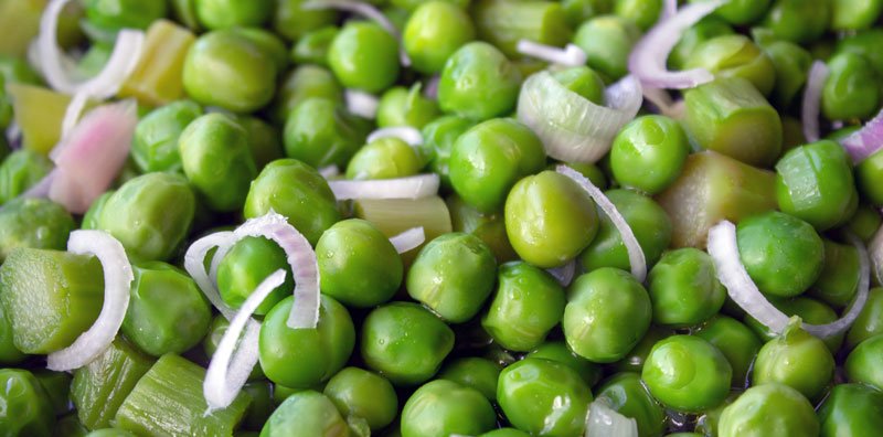 Petits pois frais aux petits oignons